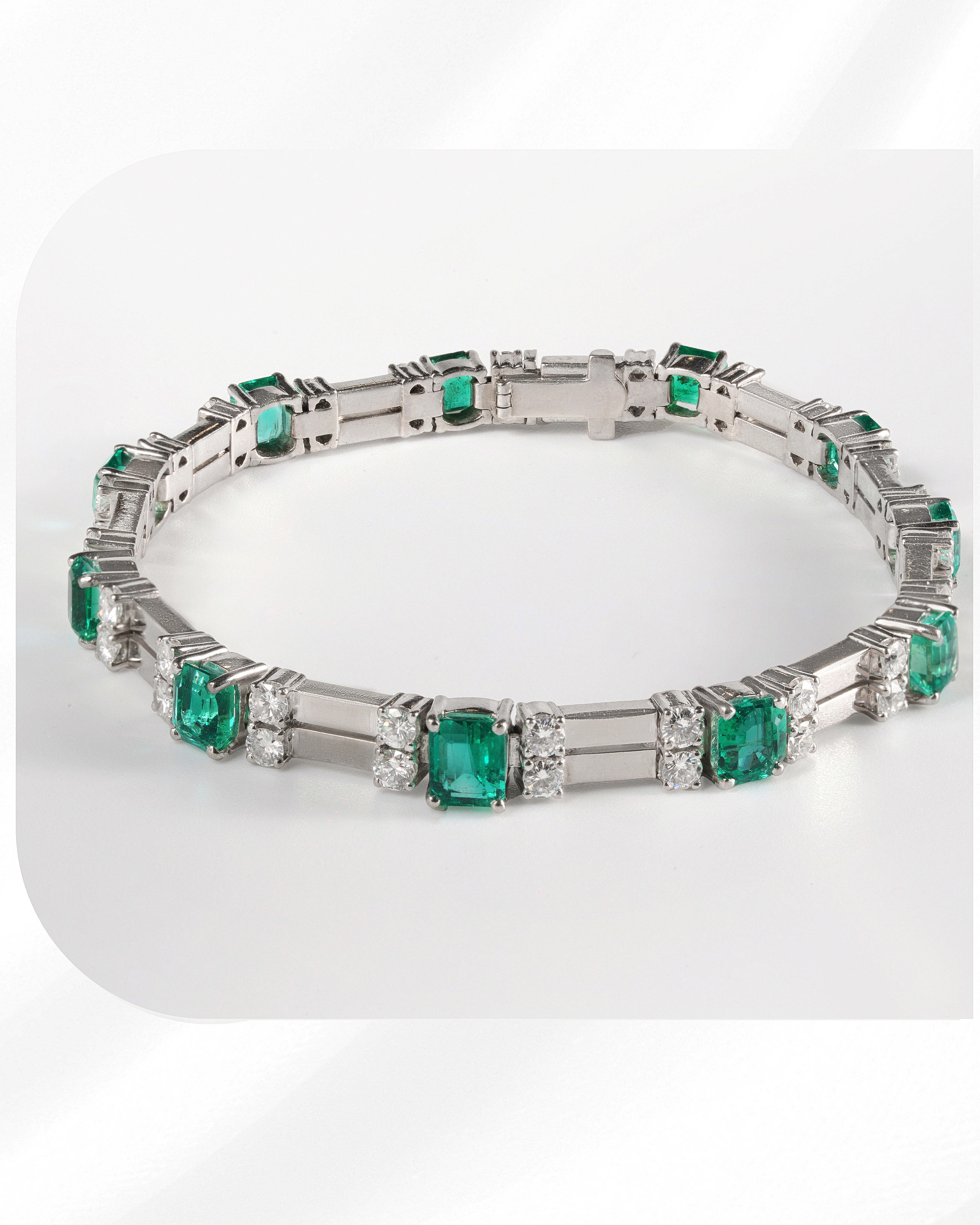Vintage Columbian emerald and diamond bracelet set on 18k white gold.