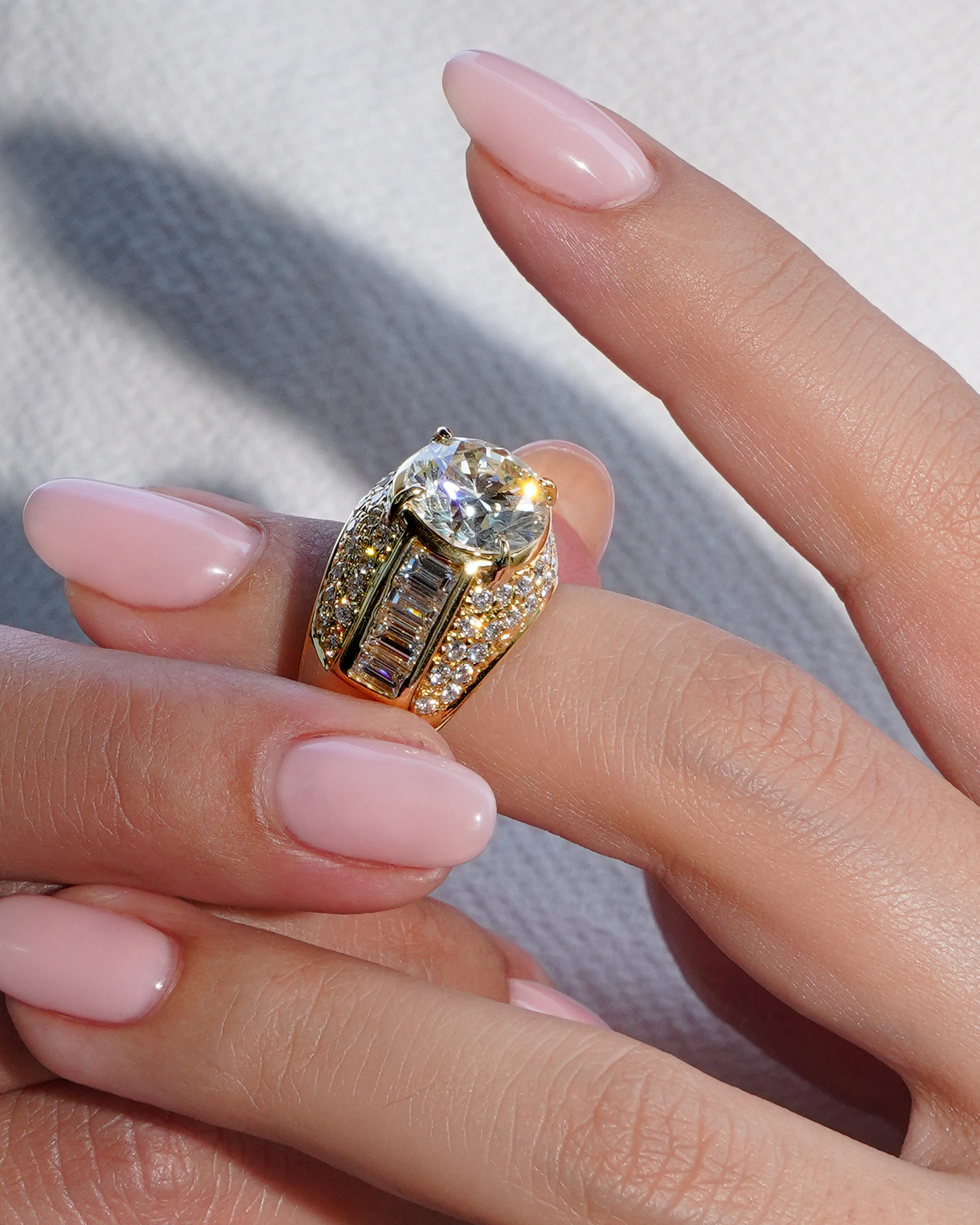 Late victorian diamond bombe ring, featuring a princess-cut diamond