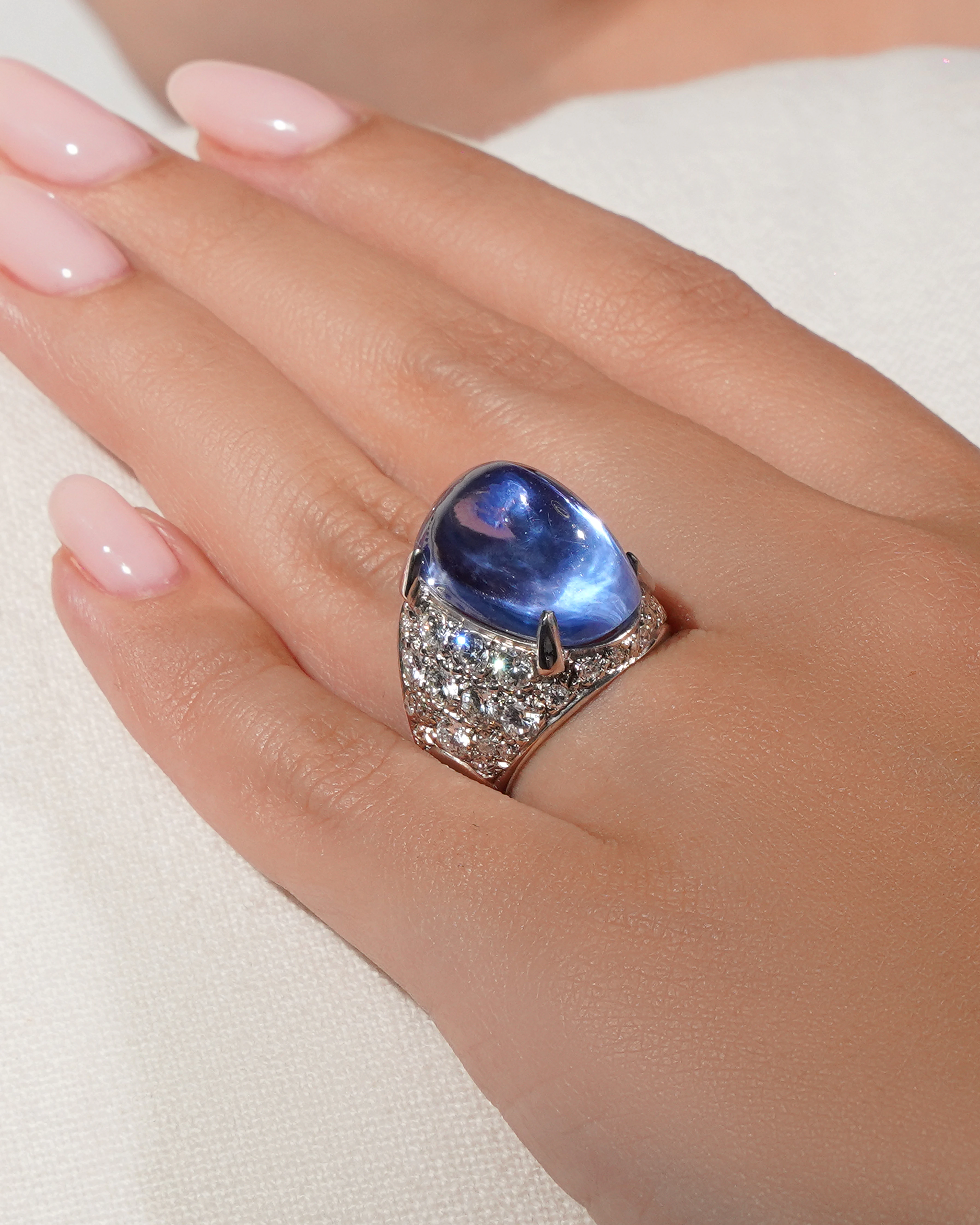 Large cabochon sapphire and diamond ring