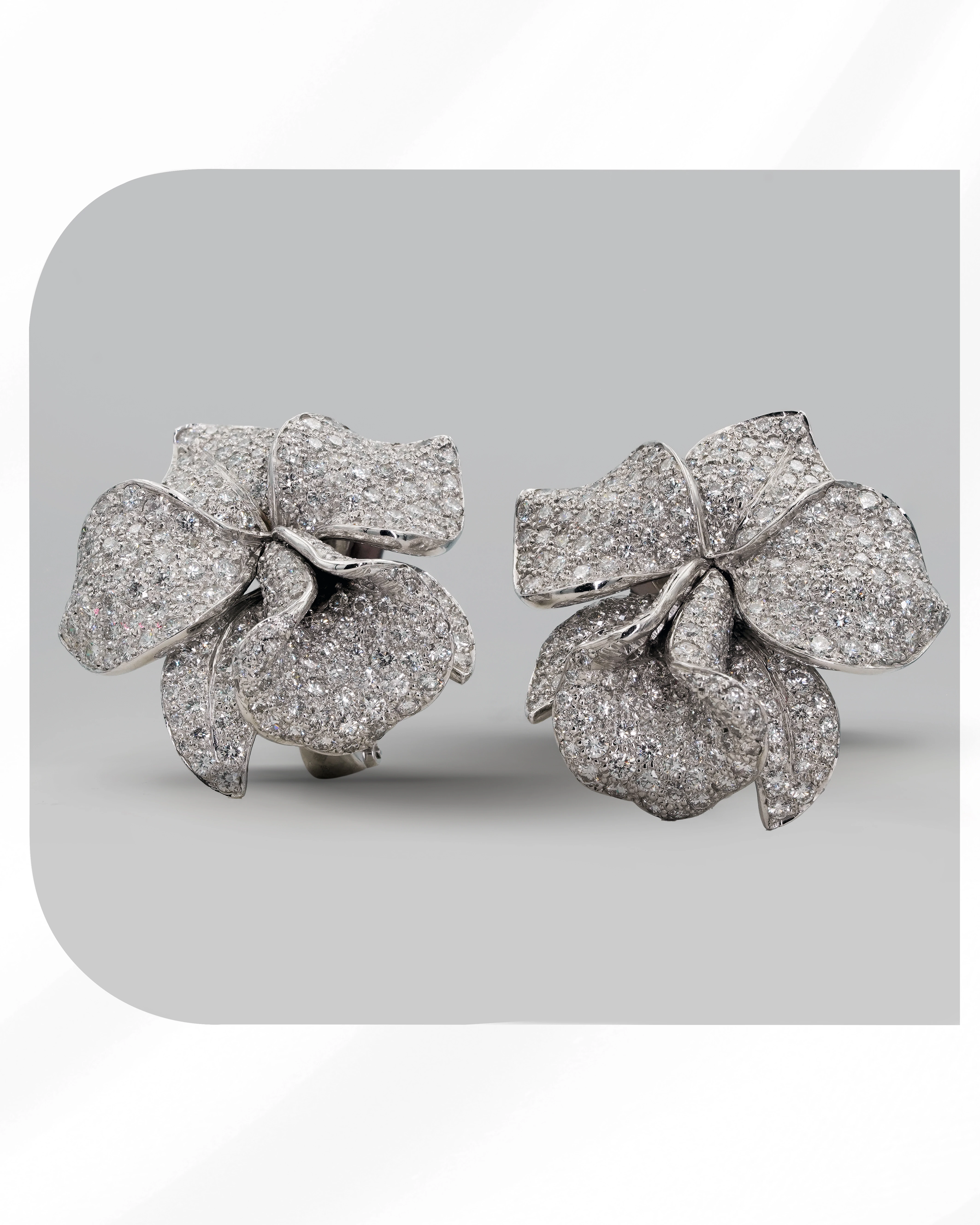 Cartier Orchid earrings, fully diamond-set in 18K white gold